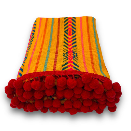 Couverture bleue + pompon jaune