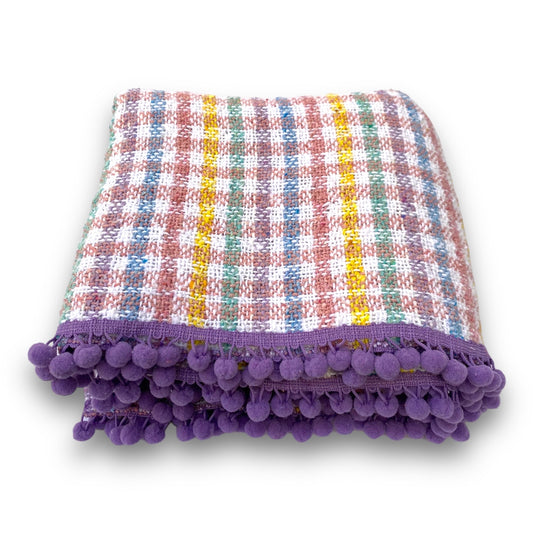 Couverture bleue + pompon jaune